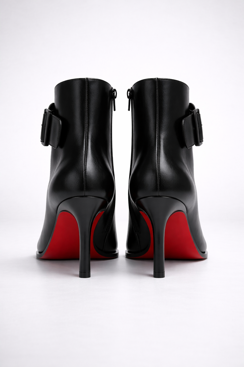 Botines de tacón con hebilla oversize