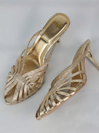 Sandalias de tacón trenzadas doradas