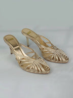 Sandalias de tacón trenzadas doradas