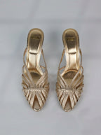 Sandalias de tacón trenzadas doradas